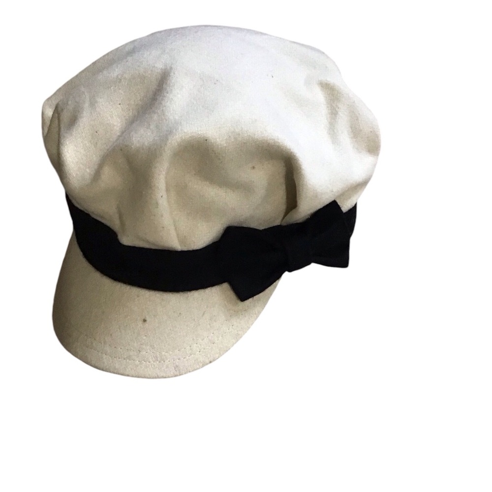 Beige and black hat with bow